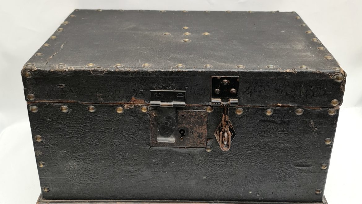 Antique Victorian Small Pine Chest Covered in Black Leather Style Material and Indented With Brass Studs Two Iron Carry Handles on Either Side Measures 10 inches tall