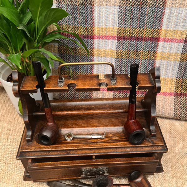 Antiques Early 20th Century Oak Wood Pipe Rack with Four Pipes.